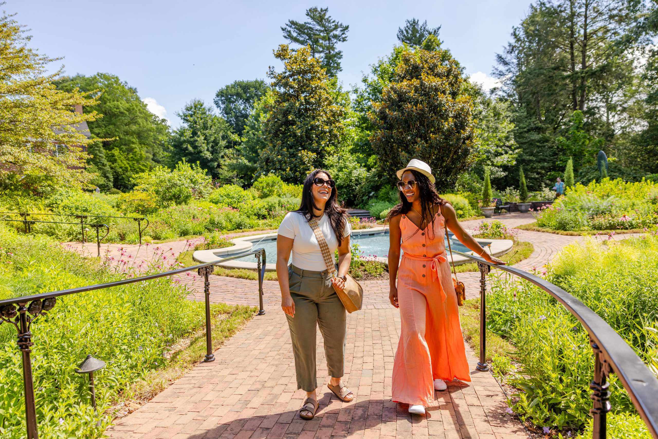 People walking together in a park during golden hour
